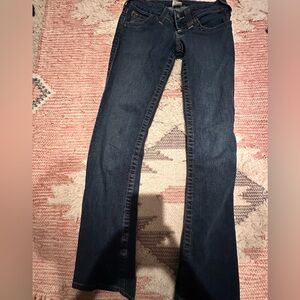 Low Rise True Religion boot cut jean with White and Blue Label.